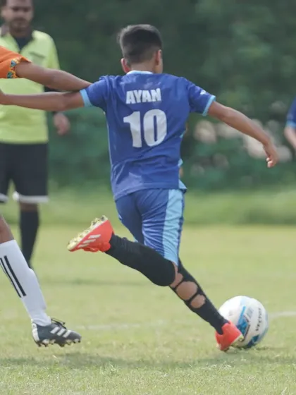 Ayan unleashes a powerful shot on goal, demonstrating the attacking prowess we nurture in our players.