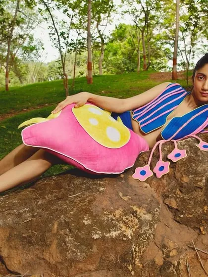 A vibrant shot for a Sazo.in brand campaign, set in a natural, outdoor environment. The art direction here focuses on creating a playful, energetic mood that reflects the brand's colorful and whimsical clothing.