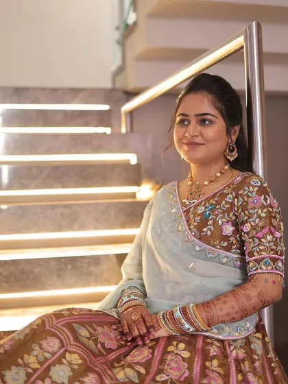 A beautiful, soft makeup look for a daytime event. The client looks elegant and poised, with makeup that enhances her natural features.