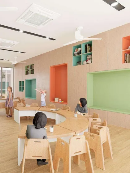 A classroom at Mother's Pet School with adaptable furniture. Low-height curved tables and colorful nooks encourage movement, collaboration, and imaginative play, keeping learning fresh and engaging.