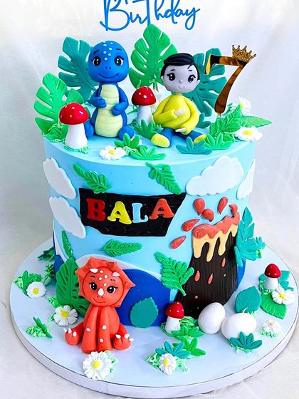 Another angle of the vibrant dinosaur cake.