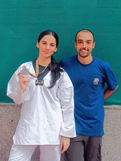 Another student and coach photo, highlighting our commitment to individual athlete development.