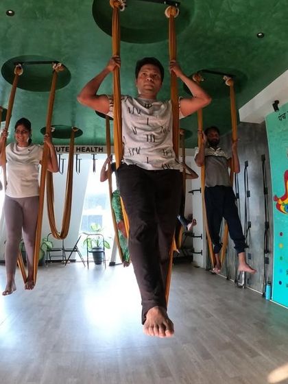 The joy of movement in our aerial yoga and sound healing workshop. The hammock allows for playful, swinging motions that open the body and lift the spirit.