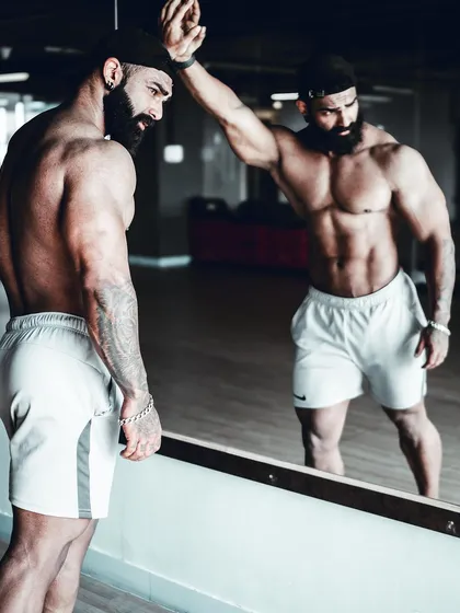 The body you see is a reflection of inner strength. It's built from overcoming fatigue, doubt, and injury. My coaching goes beyond physical training; it's about building the mental fortitude to break your own barriers and achieve goals you once thought were impossible.