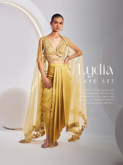 A stylized shot of the Lydia Cape Set, a source of inspiration in the world of couturier craft.