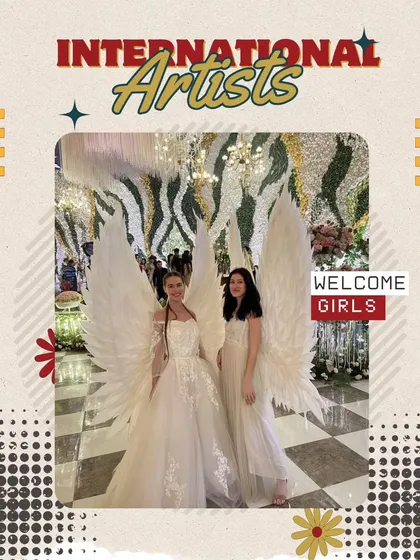 A heavenly welcome for your guests. Our international artists, like these welcome girls with angelic wings, add a touch of elegance and wonder, setting a glamorous and upscale tone for your event from the moment guests arrive.