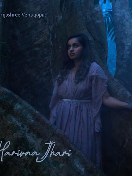 The official cover art for the single 'Harivaa Jhari'. The artwork is designed to evoke the feeling of a flowing stream in a mystical forest.