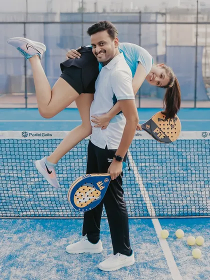 Capturing the couple's shared passion with a playful pre-wedding shoot on a Padel court. This shows how we can incorporate your hobbies and interests to create photos that truly represent you as a couple.