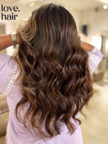 Another shot of the 'chocolate chips and crème brûlée' balayage, highlighting the texture and dimension created by the colour placement.