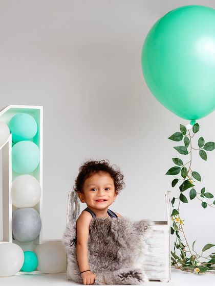 A happy smile in a simple, modern setting. This style of portrait is timeless and elegant.