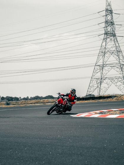 A rider on a GT 650 cornering at the CoASTT track.