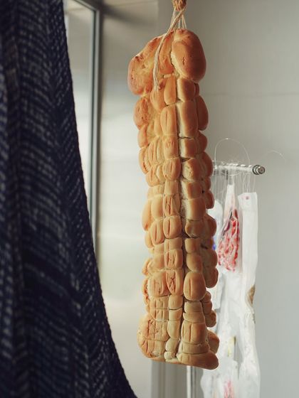 An artistic bread installation we created for a fashion store launch. This 'bread fabric' was part of a unique concept where food and fashion came together seamlessly.
