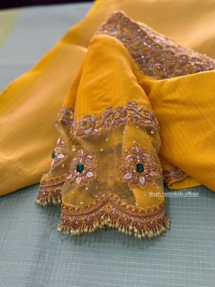 Another view of the yellow sheer sleeve blouse.