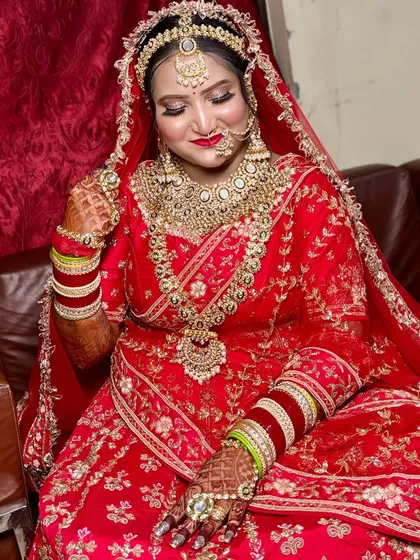 The complete royal look for her big day. I focused on creating a majestic style with heavy jewellery and a perfectly draped dupatta.