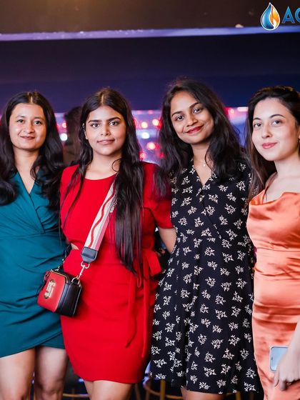 A group of friends posing for a photo.