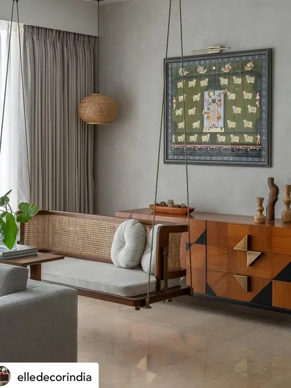 We are proud to see our work, like this traditional Indian swing set in a contemporary living room, featured in Elle Decor. This image highlights our skill in blending cultural elements with modern design, creating spaces that are both rooted and refined.