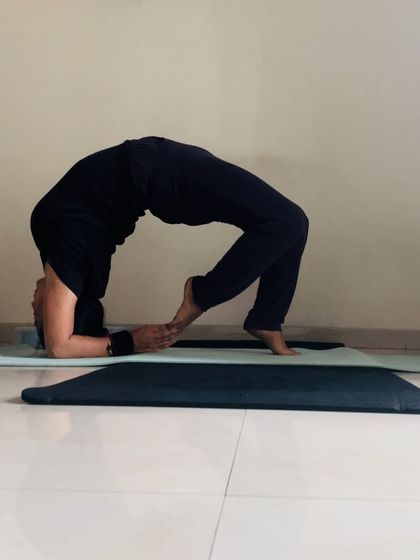 Opening up the heart chakra with a deep forearm wheel pose. This asana creates a beautiful arch in the spine, stimulating energy flow.