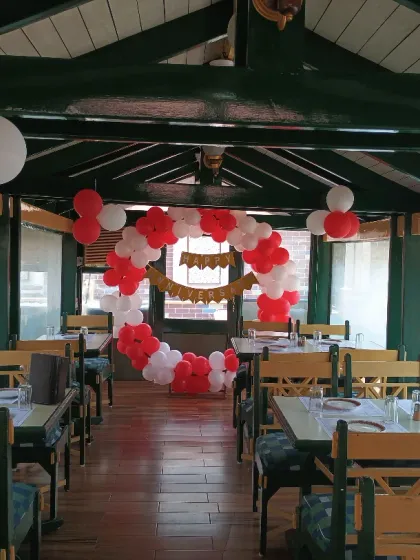 We can turn any location into a celebration space, even a boat. This was a unique anniversary decoration we did inside the Shikara Hotel boat in Navi Mumbai, creating an intimate and memorable setting.