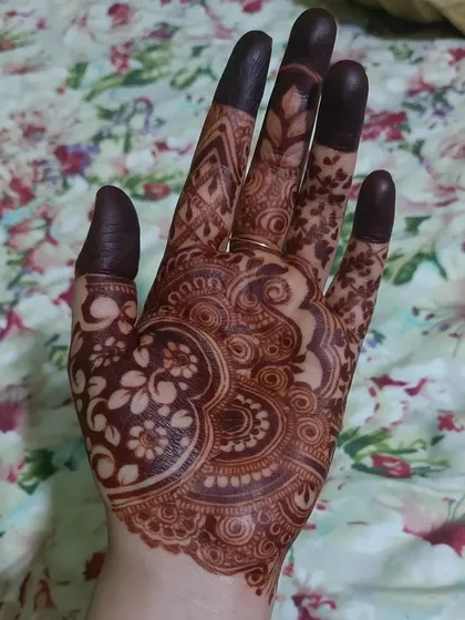 Masha Allah, what a beautiful stain. This close-up shows the deep brown and maroon tones that develop from my organic henna cones.