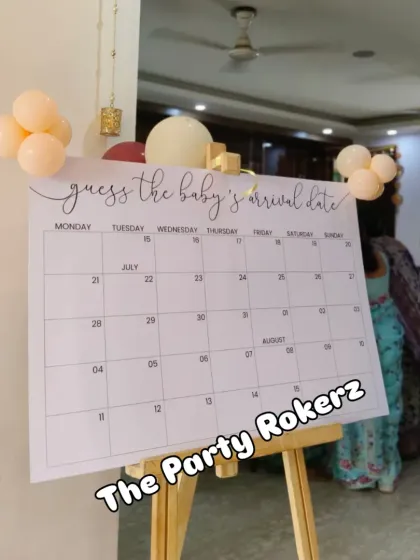 A fun and interactive "Guess the baby's arrival date" calendar, a great addition to any baby shower party.