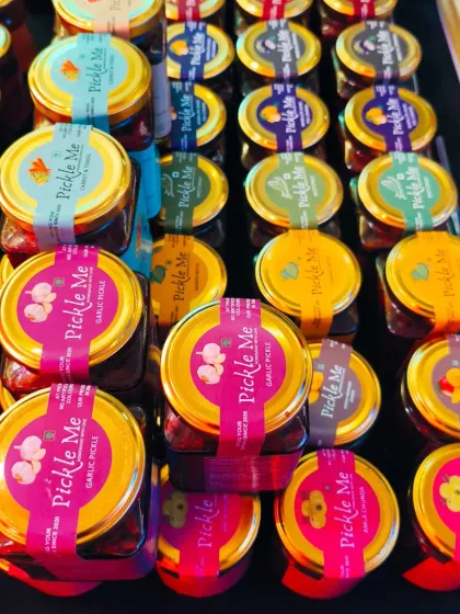 A top-down view of our vegetarian pickle section at a pop-up. The bright labels of our Garlic Pickle and Amla Chunda always catch the eye.