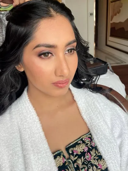 A throwback to this engagement look in progress. Even in a robe, with her hair half-done, the glowing makeup already looks stunning.