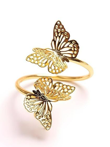 My butterfly napkin rings are designed to bring a sense of delicate, fluttering elegance to your table. The intricate, open-wing design in a polished gold finish is both artistic and graceful.