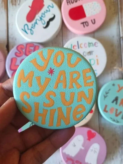 A duplicate of 82, "You are my sunshine." Our collection of quirky, hand-painted wooden magnets is perfect for spreading a little joy and love.