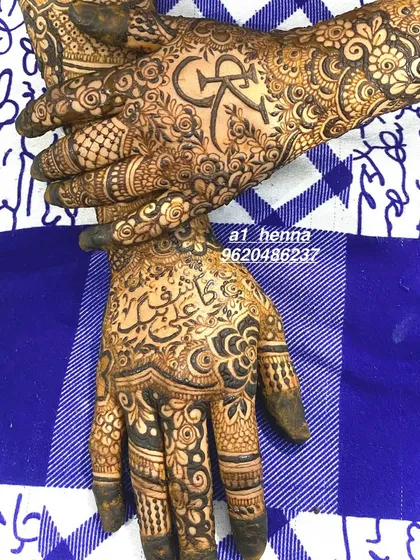 I love adding personal touches to your bridal henna. Here, I incorporated the couple's initials "CR" into the intricate design, making it a unique and meaningful part of the bride's look.