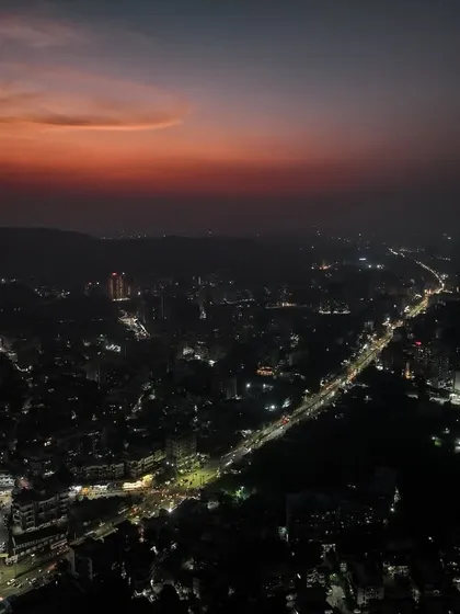 The sprawling lights of Badlapur after sunset. From above, the city looks like a galaxy of its own.