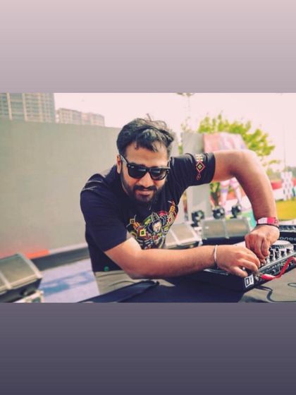 A photo of me in my element, getting ready to drop some serious tracks. This was taken before a high-energy psytrance set.