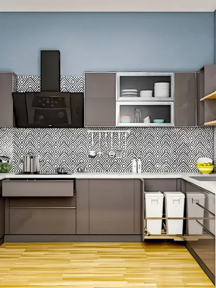 This U-shaped modular kitchen is designed for ultimate efficiency. It features high-gloss laminate cabinets, a stylish patterned backsplash, and smart storage solutions like pull-out waste disposal units to keep the space organized and functional.