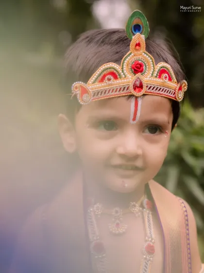 I often use creative photography techniques to add an artistic feel to my portraits. This soft-focus shot gives a dreamy, ethereal quality to this image from the Little Krishna series.