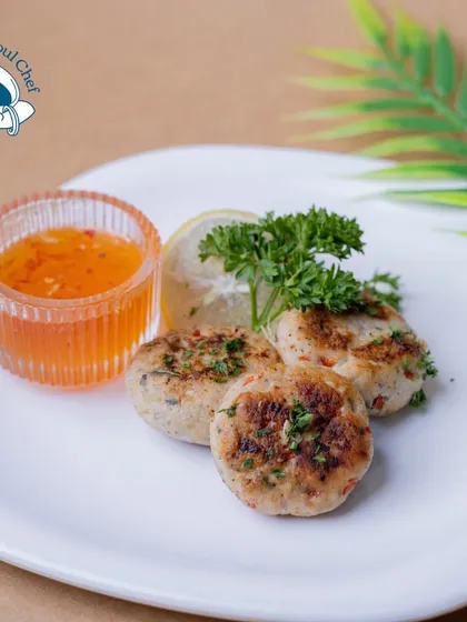 These East Asian Lemongrass-Infused Fish Cakes are light, zesty, and packed with flavor. Served with a sweet chili sauce, they are a perfect appetizer for those who enjoy Asian cuisine.