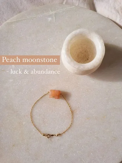 The peach moonstone 'haati' elephant bracelet, a charm for luck and abundance. It's a beautiful reminder of your own inner strength.