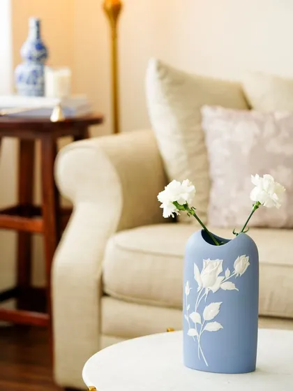 A collection of our product photography for various home decor and tableware brands. These shots display a range of items including placemats, table runners, ceramic bowls, plates, vases, bar tools, and candles, all styled to perfection.