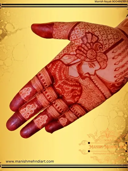 A close-up of a groom portrait after the henna stain has fully developed. Creating these figures is a special skill, and I take great pride in capturing the likeness and emotion for your special day.