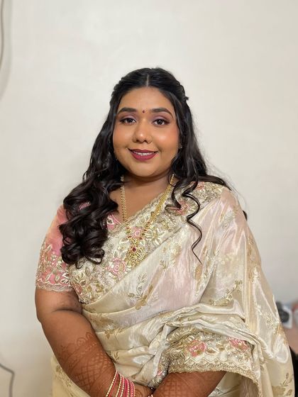 The bride is glowing and happy, showcasing her complete engagement look.