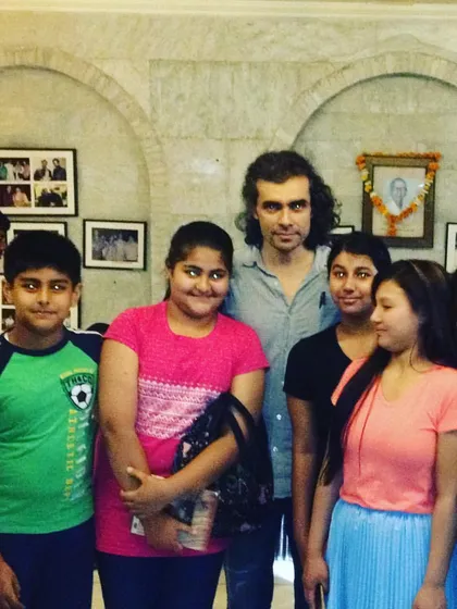 Film director Imtiaz Ali posing with a group of my enthusiastic students. These interactions are a core part of the inspiring and connected environment I foster.