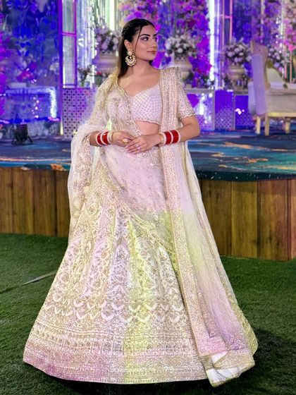 Another shot of this gorgeous ivory lehenga. Our team ensures a perfect fit and finish, even for last-minute deliveries.