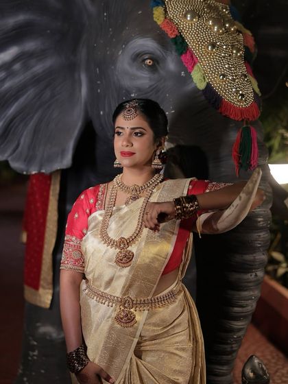 Anusha looking like royalty for her wedding day. Her airbrush makeup provides a smooth, glowing complexion that is perfect for bridal portraits.