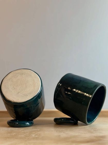 A custom order for a pair of mugs in my signature Forest Green glaze. I love creating pieces that are tailored to someone's specific vision.