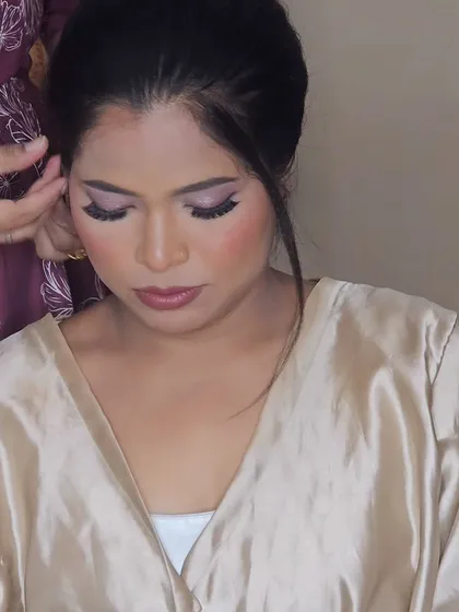 A close-up of a bride's soft and romantic eye makeup for her Christian wedding.