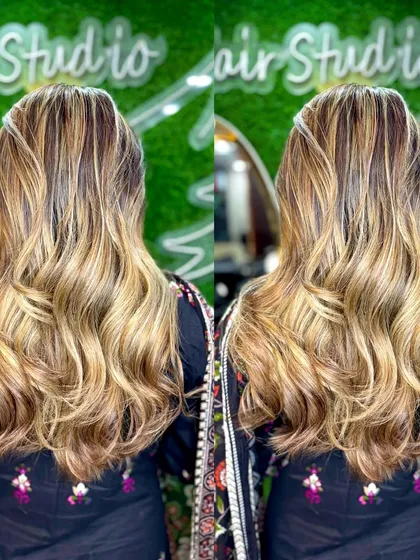 A dual view of this gorgeous blonde balayage with soft waves. This shows the look from the back, highlighting the seamless blend.