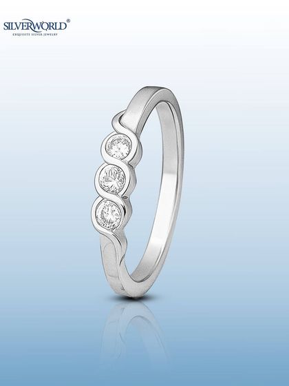 This elegant three-stone zirconia ring symbolizes the past, present, and future. It's a classic design, perfect as a promise ring or an anniversary gift.