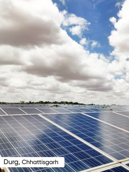 Solar arrays under a cloudy sky at a cement facility in Durg, Chhattisgarh. Our projects have generated over 1,400 million units of green energy for the cement sector, reducing CO₂ emissions by 1.3 million tonnes.
