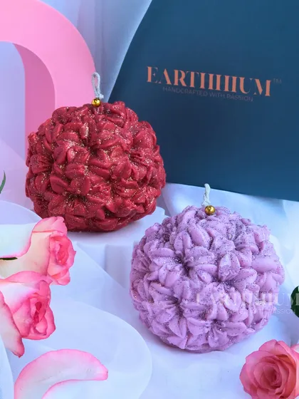 A deep red and soft lilac version of the floral sphere candle, offering a more romantic and moody vibe.