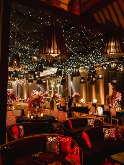 Cocktail hour with a serious glow-up. We used a canopy of a thousand tiny stars, ambient lighting, and luxe textures to design a night where the decor sparkles as much as the champagne.