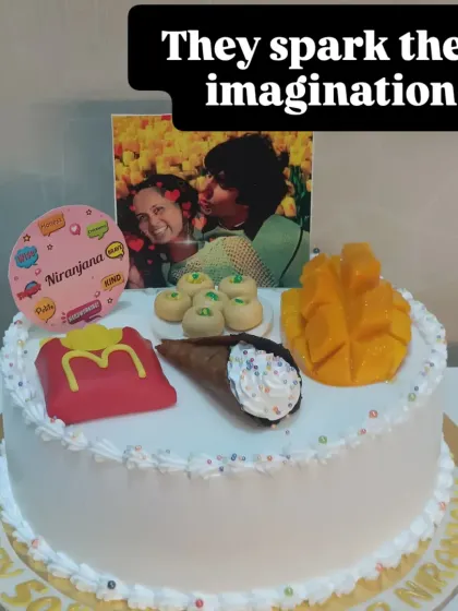 Every cake tells a story. This one is a collection of someone's favorite things: mangoes, McDonald's, and more. I love bringing these personal ideas to life.