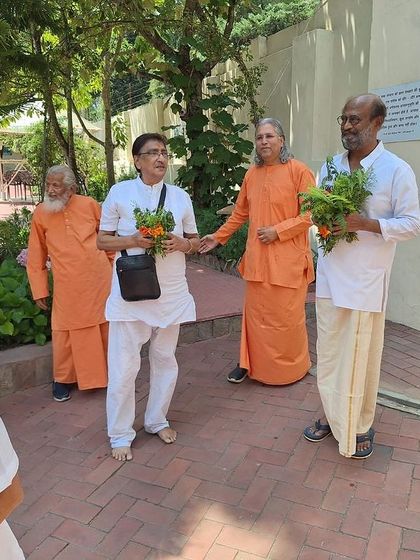 With fellow devotees and monks. The path of spirituality is enriched by the company of others who share the same goal of seeking divine connection.